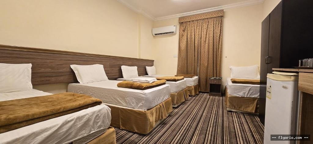 Funduq DYWF ALMQAM WAHD TWSYL MJANY LLHRM - Douof Al Maqam One Hotel Free Shuttle Service Photo