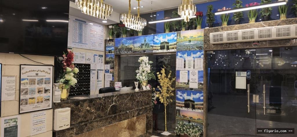 Funduq DYWF ALMQAM WAHD TWSYL MJANY LLHRM - Douof Al Maqam One Hotel Free Shuttle Service Photo